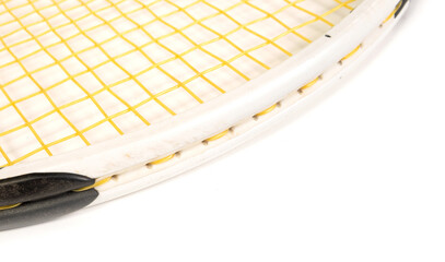 Close up of tennis racket on white