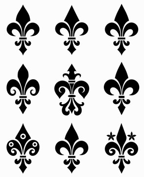a set of black and white fleurons