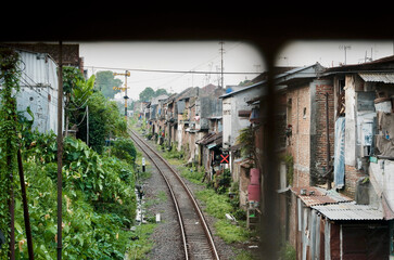 Railway-Side Neighborhood – A Close-Knit Community Living by the Tracks in Urban Landscape