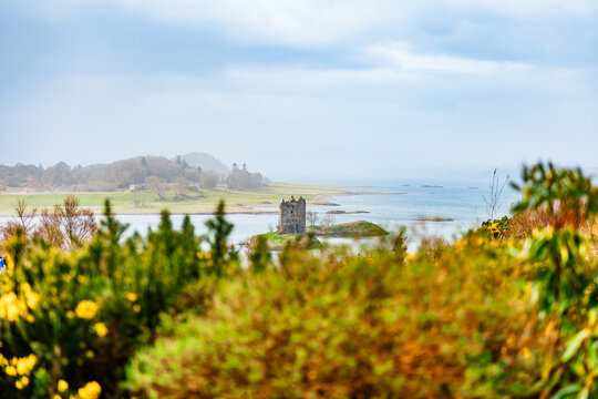 Castle Stalker Surrounded by Foliage and Haze