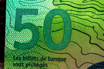 CHF money banknotes, detail photo of swiss franc