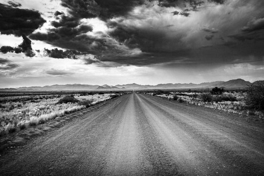Long straight gravel road with washboard, Namib Desert, Namibia