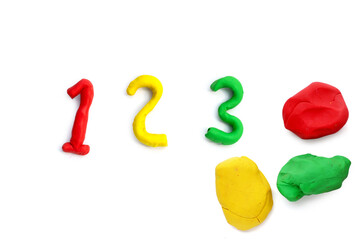 Alphabet with number made of colorful plasticine clay on white.