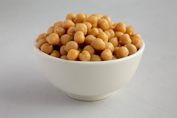 Homemade Preserved Chickpeas in a Bowl, side view. Close-up.