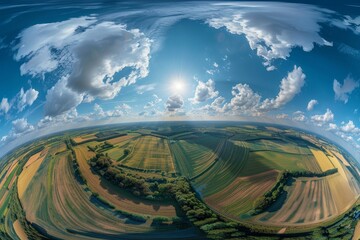 360 degree HDRI aerial view above countryside fields for sky replacement in drone shots