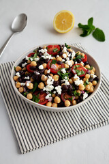 Homemade Chickpea And Black Bean Salad in a Bowl, low angle view. Close-up.