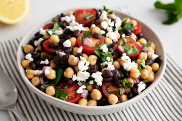 Homemade Chickpea And Black Bean Salad in a Bowl, low angle view.