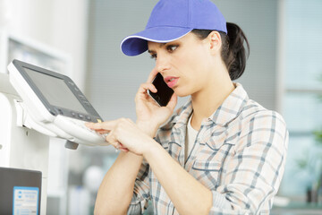 service female specialist talking to client on smartphone