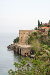 Naklejka premium Historical Alanya Shipyard and Kizil Kule walls located in Alanya district of Antalya