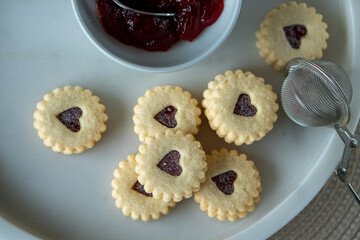 Traditional swiss cookies called Spitzbuben filled with jam.