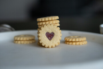 Traditional swiss cookies called Spitzbuben filled with jam.