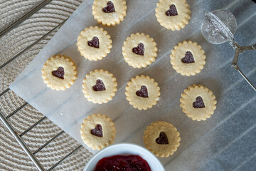 Traditional swiss cookies called Spitzbuben filled with jam.