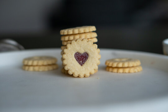 Traditional swiss cookies called Spitzbuben filled with jam.
