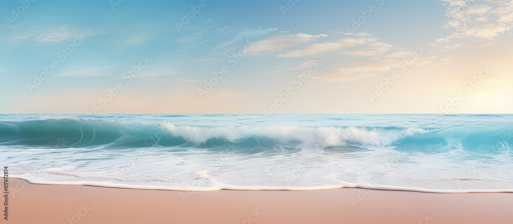 Poster A gentle wave brushes against the sandy shore creating a serene summer background with enough room for a message. Creative banner. Copyspace image
