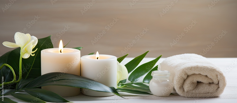 Aufkleber a top down composition shows a spa themed arrangement with a cream jar green leaves and candles crea