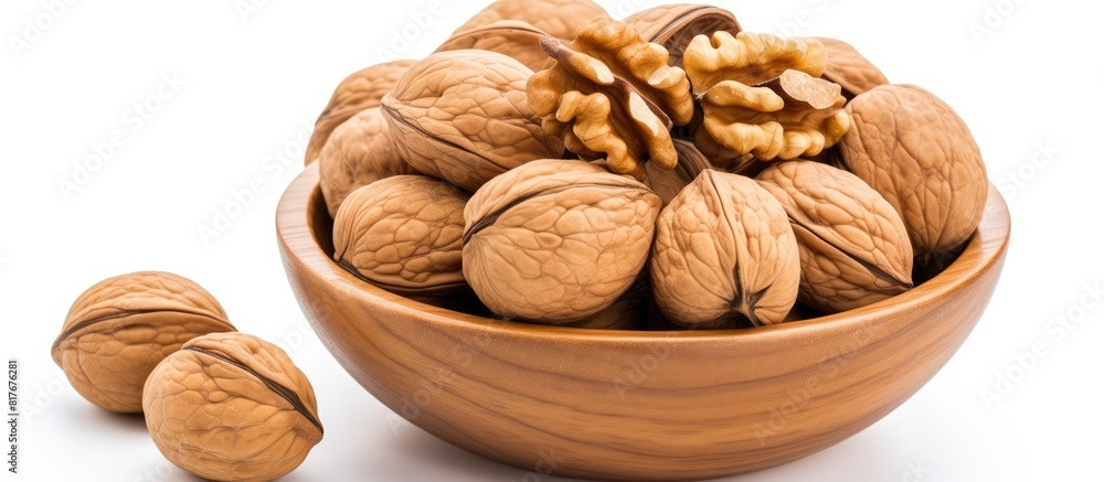 Aufkleber A top view of a bowl of walnuts isolated on a white background providing copy space for adding text or images to the image