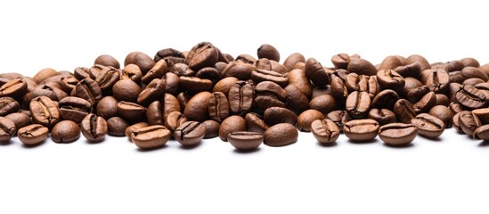 Copy space image of coffee beans on a white background perfect for adding text