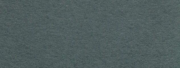 Texture of craft dark green and gray paper background colors, macro. Structure of vintage kraft teal cardboard.