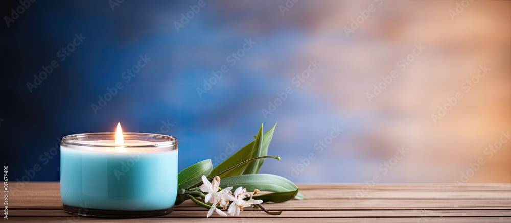 Poster spa a serene setting with a flickering candle and a small blue ceramic perfect for relaxation and tr