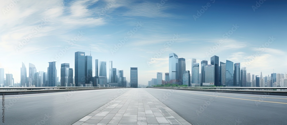 Poster empty road surrounded by a panoramic skyline of buildings with plenty of copy space for images 118 c