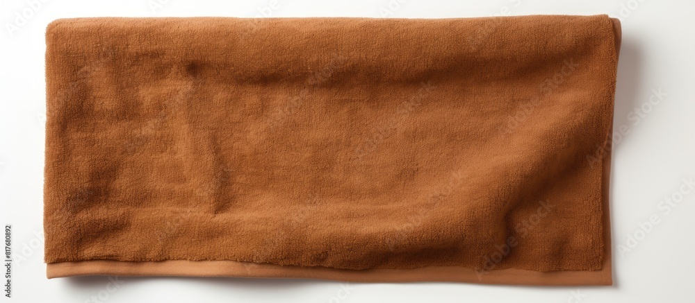 Poster an isolated brown bath towel made of 100 cotton terry viewed from the top with a white background co
