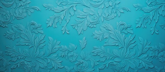 A cyan colored vintage wallpaper with a light blue textured background offering ample copy space for images