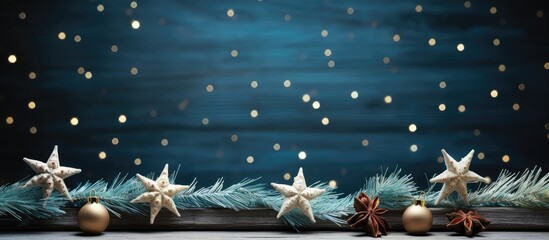 A copy space image of Christmas decorations set on a rustic blue wooden table - Powered by Adobe