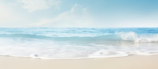 The sandy beach and tropical sea create a soft wave serving as the backdrop for this beautiful copy space image
