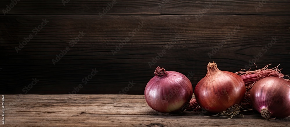 Poster A copy space image of onions placed on a rustic weathered wood table