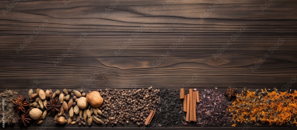 Poster Wooden background with various types of dry tea arranged in a flat lay composition creating a visually appealing copy space image