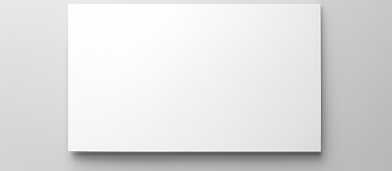 Obraz premium A white document displayed on a plain white surface providing ample empty space for images or text