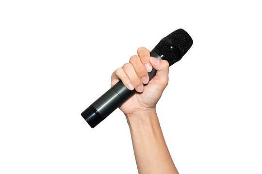 Close-up of a human hand holding a black wireless microphone on white background. Concept of public speaking, performance, singing, podcasting, or broadcasting. High-resolution studio shot.