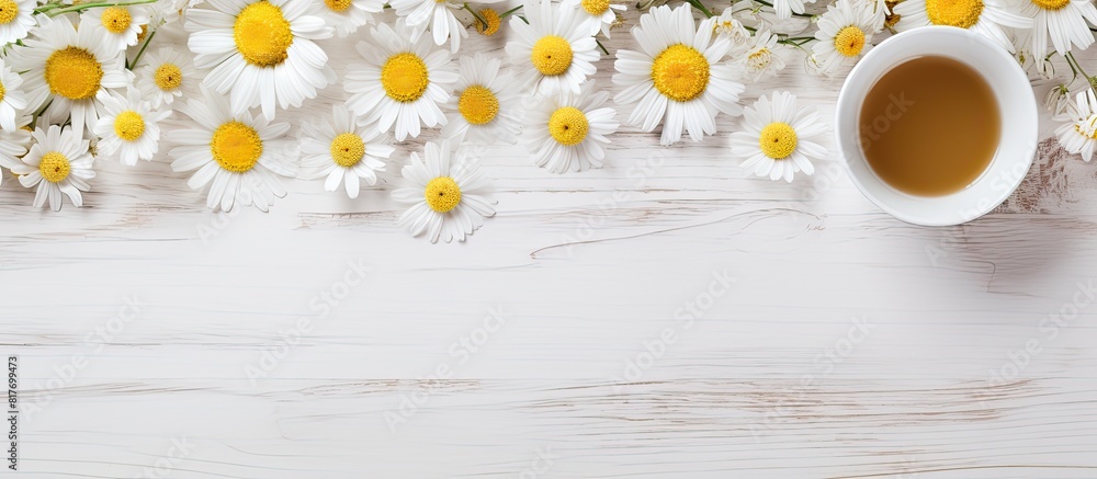 Poster A copy space image featuring a cup of tea and chamomile flowers arranged on a white wooden table creating a flat lay composition
