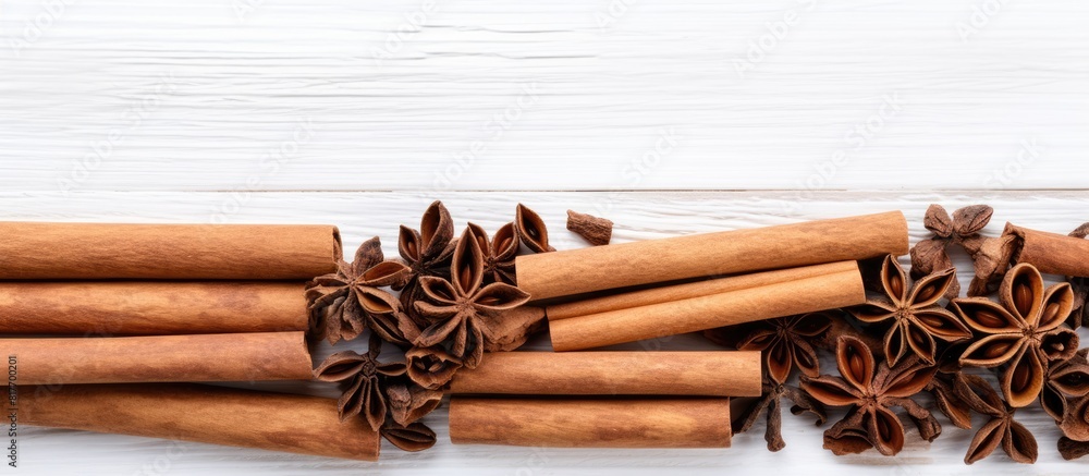 Aufkleber White wooden background with cinnamon sticks offering ample space for adding text or images