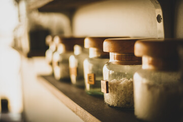 the bottle on the shelf with dramatic tone