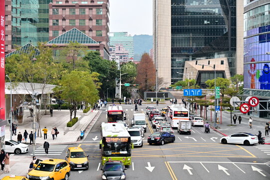 Taiwan - Jan 26, 2024: Captured from a Xinyi Skybridge, this intersection is a vital commercial center featuring Taipei 101 and Xinyi District's largest shopping and dining venues.