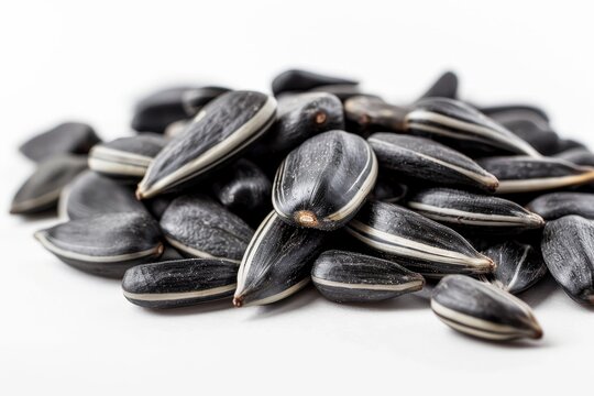 Close up of yummy sunflower seeds on white background