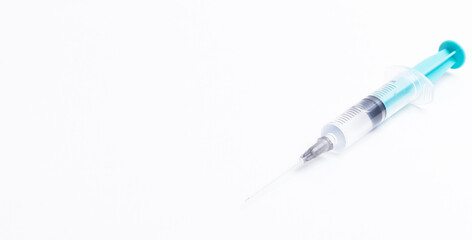 Disposable plastic syringe prepared for injection and vaccination in the hospital. The concept of...