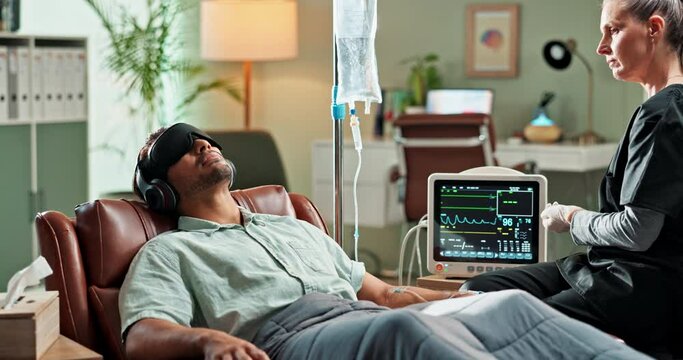 Psychedelic therapy, medicine and man with headphones for examination, ok sign or sensory deprivation. Patient, iv drip and medical nurse with injection for ketamine, treatment or mental health study