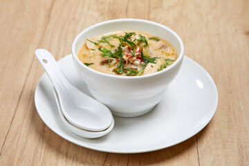 Bowl of thai Tom Kha Kai soup