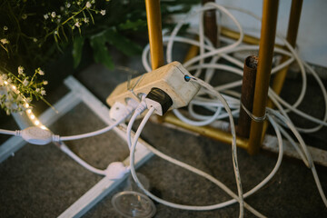 Four-plug electrical outlet with all terminals in use.