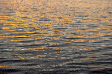 beautiful sky and reflection of the sun and sky in the lake water