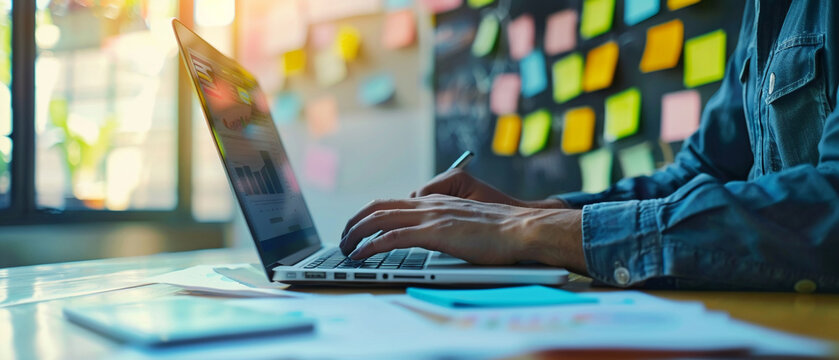 Business developer using Kanban board framework on laptop computer. Agile software development lean project management tool project management