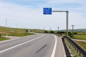 Road and road sign in Romania.