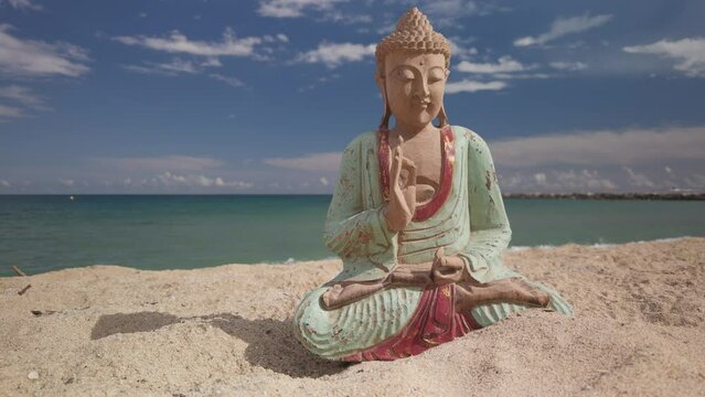 buddha statue on a beach