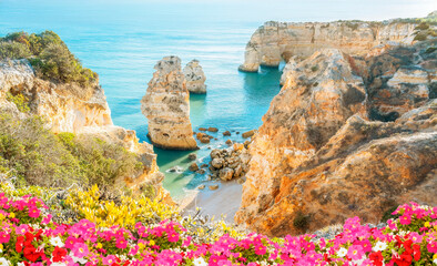 Algarve, Portugal -  Panoramic view of cliffs in the beautiful Marinha beach - Summer vacation...
