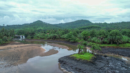 a body of water near trees in the middle of nowhere, Sao Tome, Africa