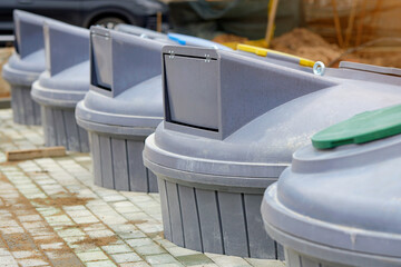 Underground waste separation system with separate recycling containers, sustainable urban...