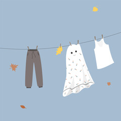 Fototapeta premium Ghost sheet and clothing drying on a rope cartoon. Vector isolated illustration.