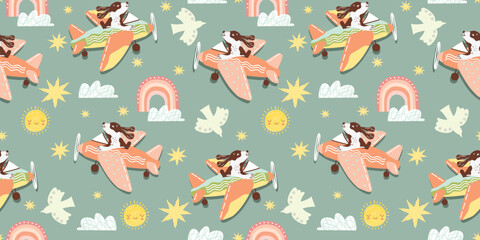 Hand drawn seamless pattern with doggy flying on an airplane.Cute background with funny character,stars,clouds,rainbow and birds.Cartoon print on fabric and paper.Vector design for nursery decor.